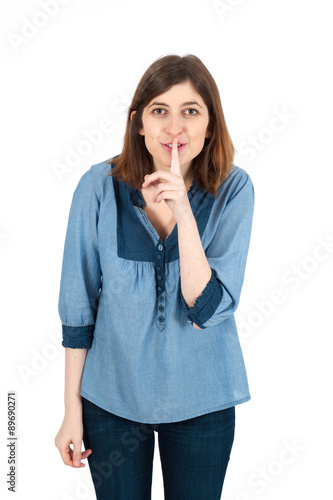 Beautiful woman doing different expressions in different sets of clothes: be quiet