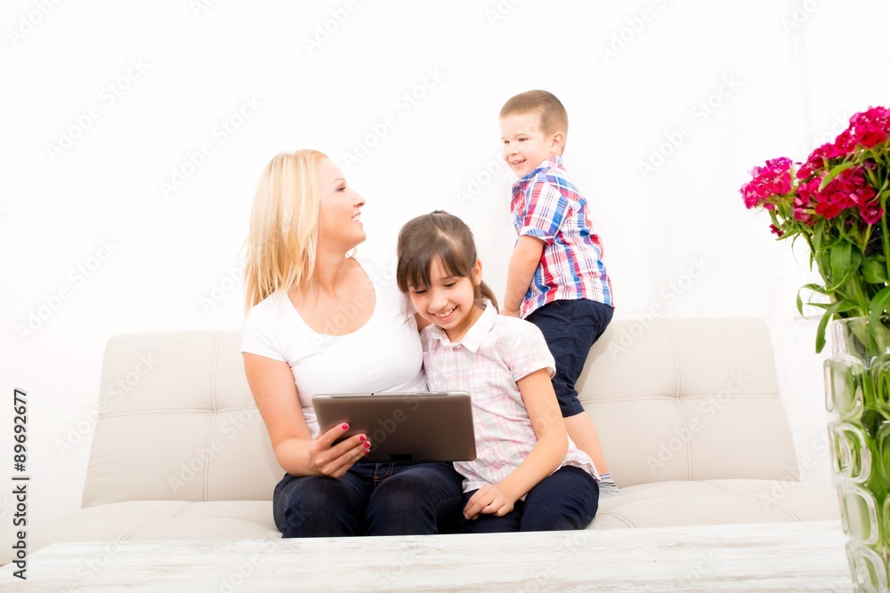 Mother using a Tablet PC Mother using a Tablet PC