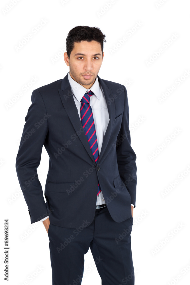 Handsome man doing different expressions in different sets of clothes: hands in pockets Handsome man doing different expressions in different sets of clothes: hands in pockets