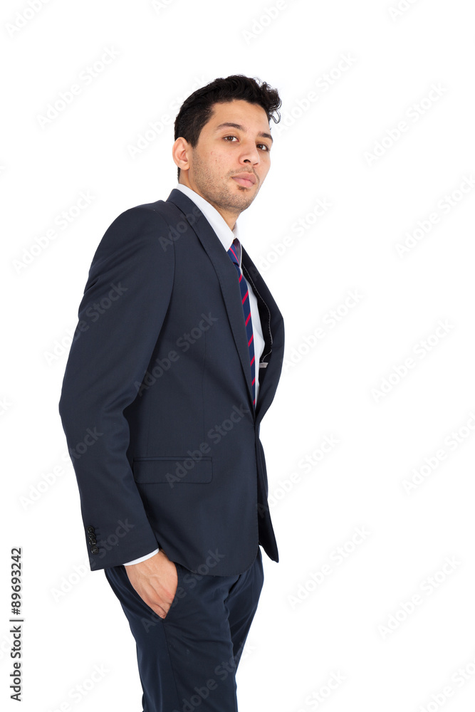 Handsome man doing different expressions in different sets of clothes: hands in pockets Handsome man doing different expressions in different sets of clothes: hands in pockets