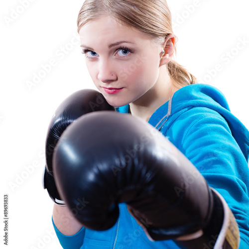 Young woman in boxing gloves © stormy