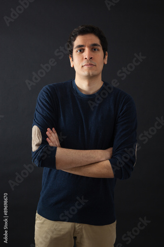 Handsome men doing different expressions in different sets of clothes: arms crossed