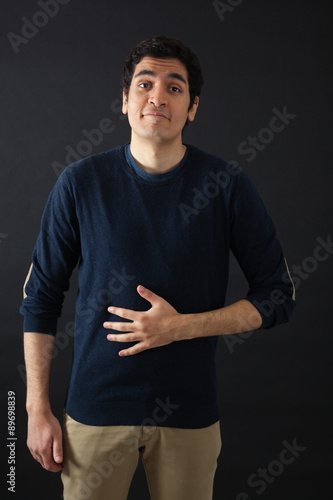 Handsome men doing different expressions in different sets of clothes: hungry