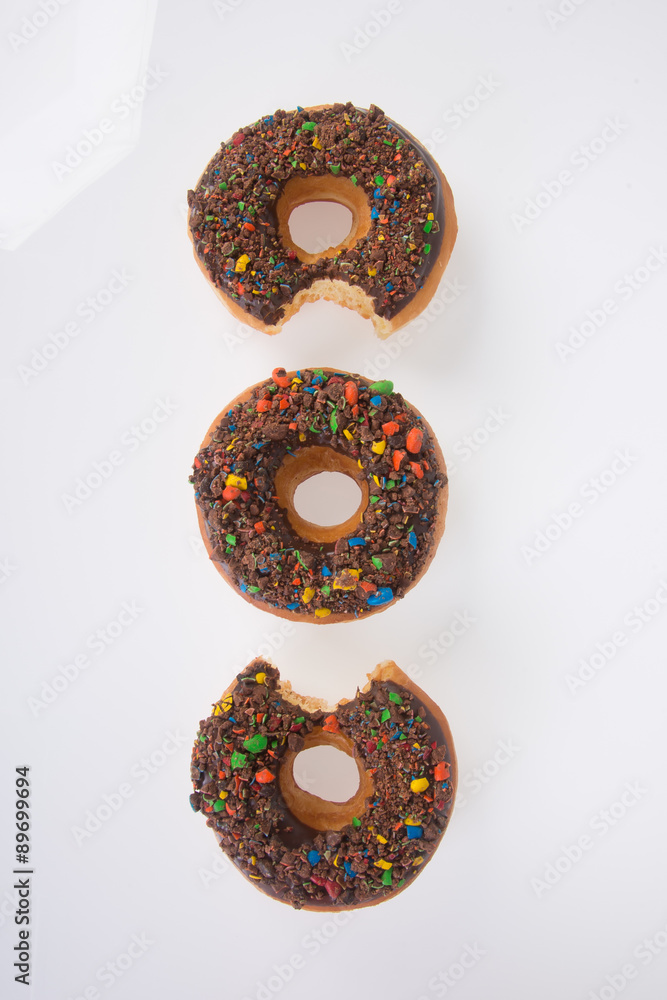 chocolate donuts on a white background chocolate donuts on a white background