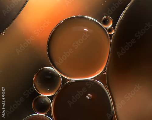 Abstract background, oil droplets on water surface, macro abstraction