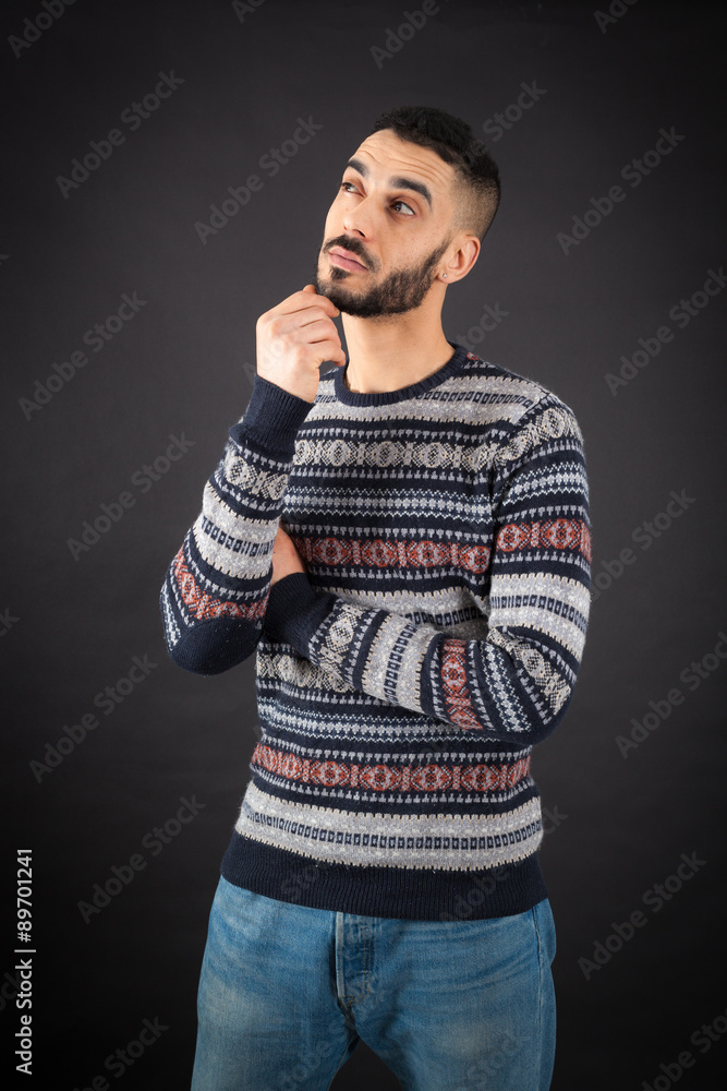 Handsome man doing different expressions in different sets of clothes: thinking Handsome man doing different expressions in different sets of clothes: thinking