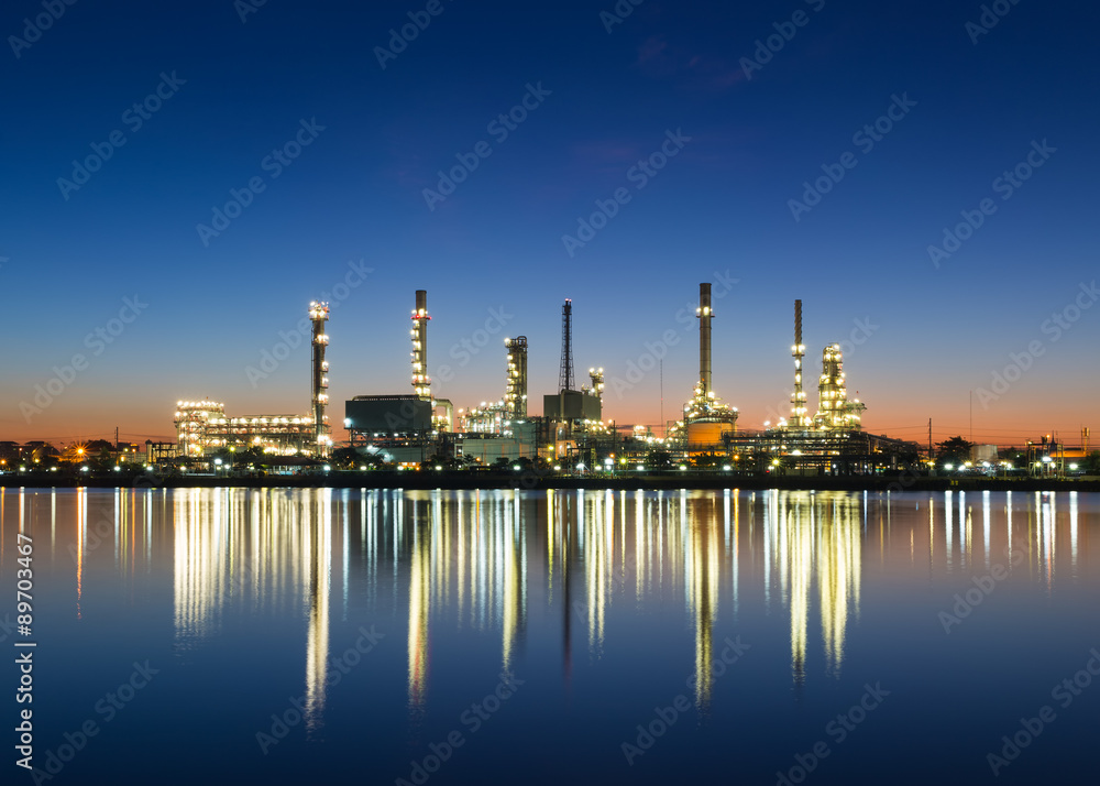 Oil refinery along Chao Phraya river at dusk Bangkok, Thailand