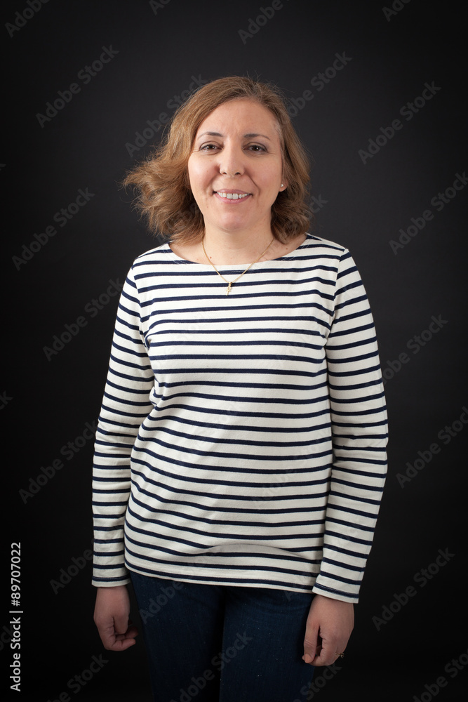 Beautiful woman doing different expressions in different sets of clothes: smile Beautiful woman doing different expressions in different sets of clothes: smile