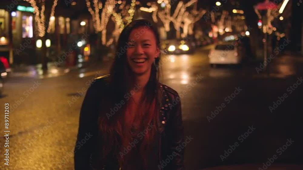 Portrait of a young woman in the city at night Portrait of a young woman in the city at night