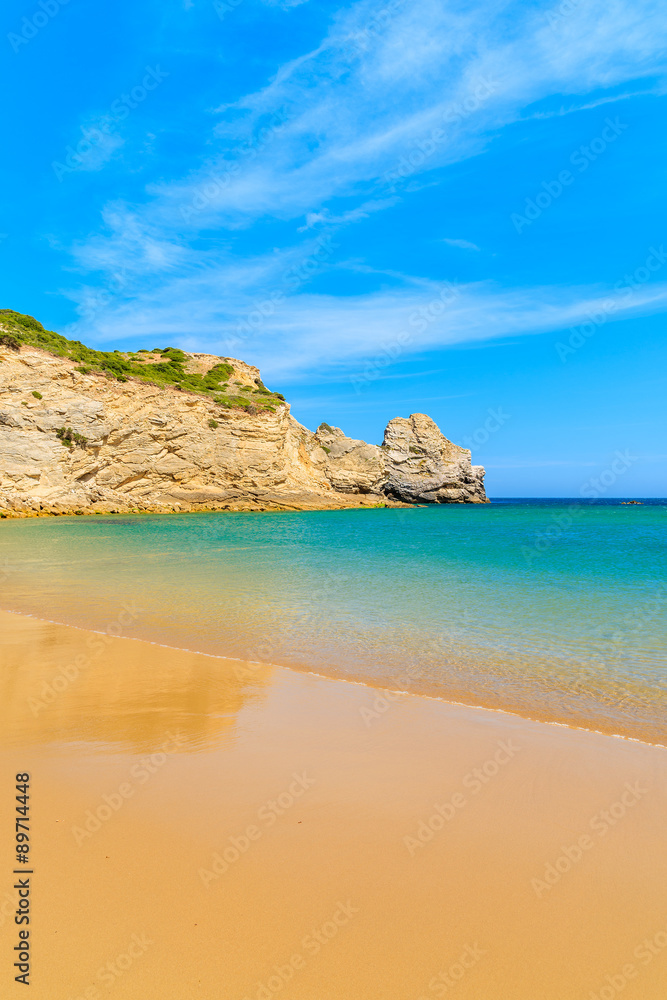 Golden sand Barranco beach on western coast of Portugal Golden sand Barranco beach on western coast of Portugal