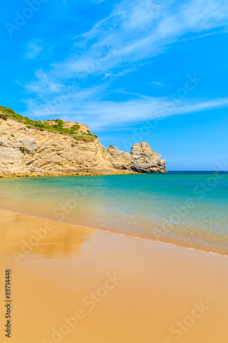 Golden sand Barranco beach on western coast of Portugal