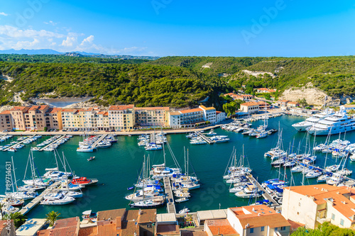 View of Bonifacio port with colorful houses and boats, Corsica island, France. © pkazmierczak