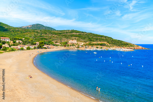 View of beautiful bay with beach in Galeria town, Corsica island, France