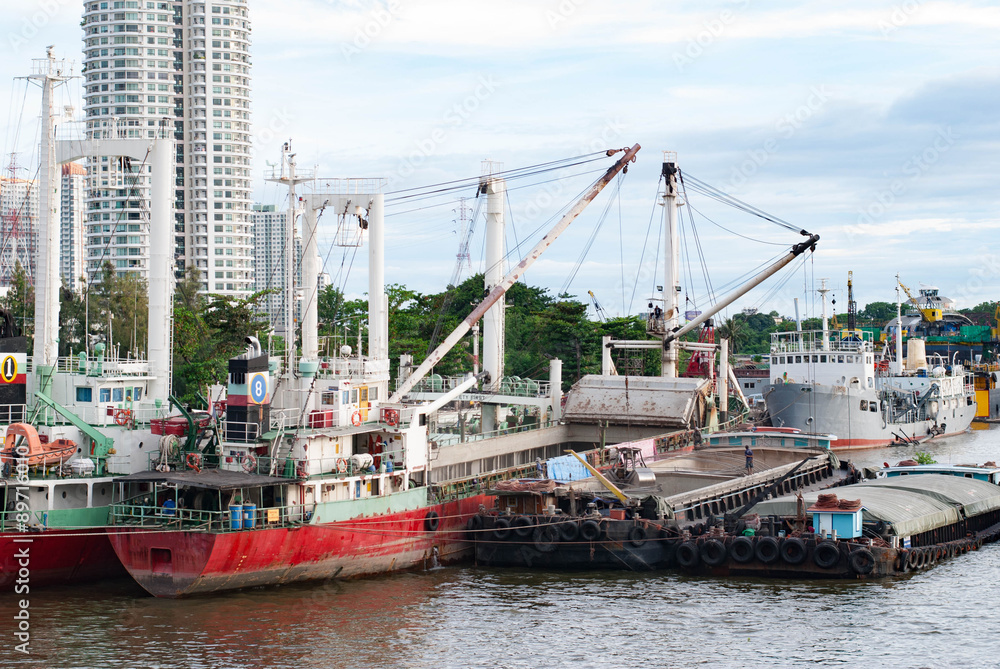 Cargo Ship docked in Chao Phraya River, Bangkok, Thailand
