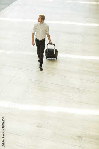 Young man with suitcase