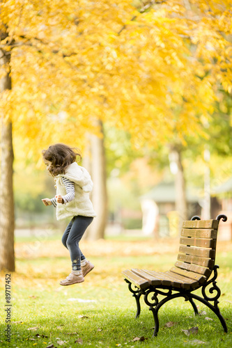 Little girl at the bench