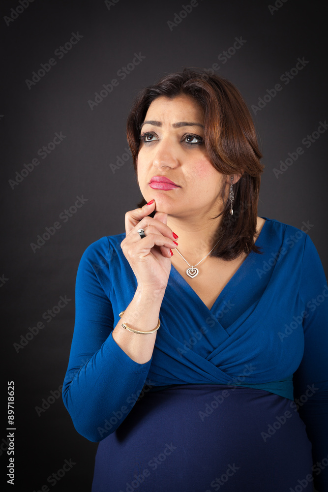 Beautiful woman doing different expressions in different sets of clothes: thinking Beautiful woman doing different expressions in different sets of clothes: thinking