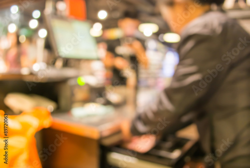 blurred image of shopping mall and people © coffmancmu