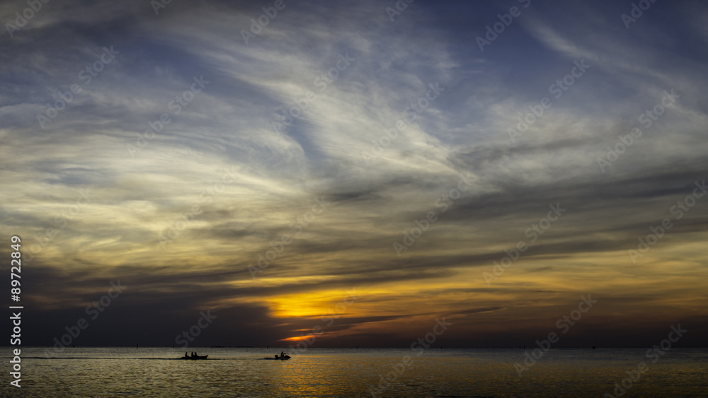 Silhouette of sportsman with jet ski at sea