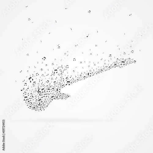 Electric guitar from floating notes isolated on white background.