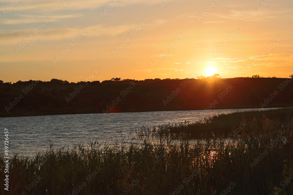 Sunrising over a peaceful lake in Oklahoma