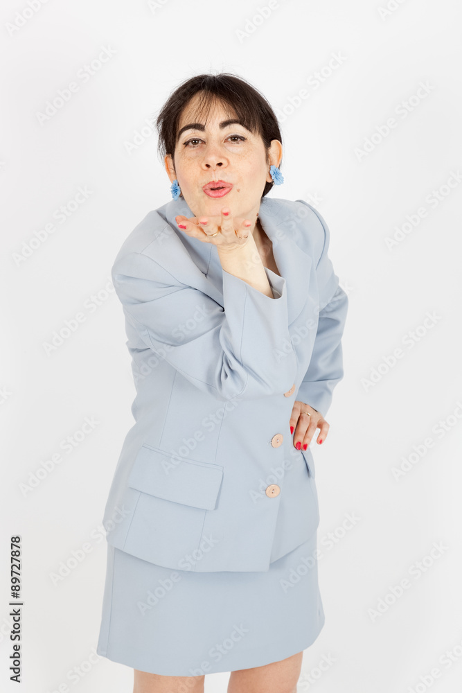 Beautiful woman doing different expressions in different sets of clothes: kiss Beautiful woman doing different expressions in different sets of clothes: kiss