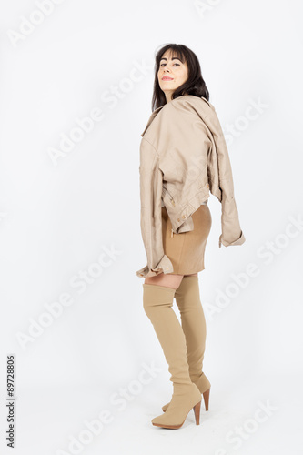 Beautiful woman doing different expressions in different sets of clothes: posing