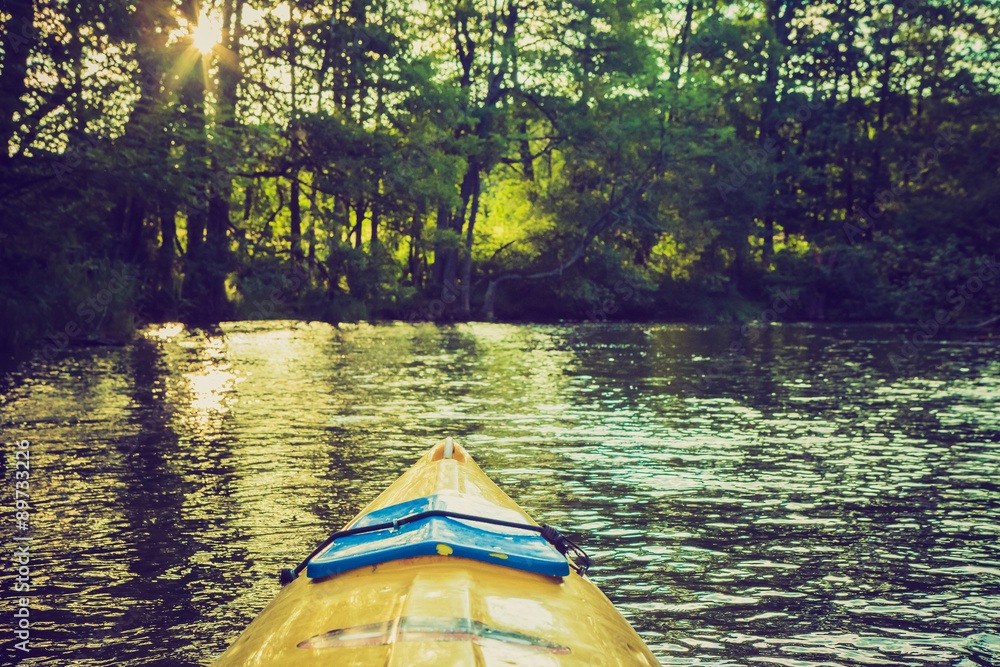 Fototapeta premium Vintage photo of kayaking by Krutynia river in Poland
