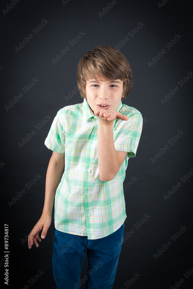 Handsome boy doing different expressions in different sets of clothes: kiss Handsome boy doing different expressions in different sets of clothes: kiss