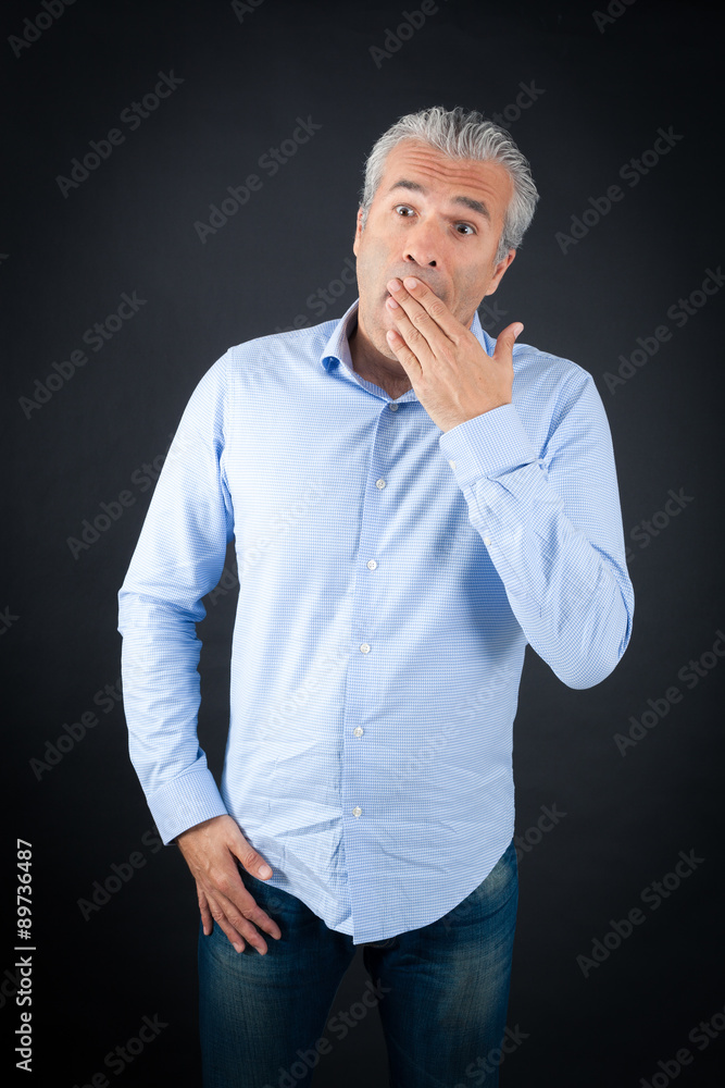 Handsome man doing different expressions in different sets of clothes: yawn Handsome man doing different expressions in different sets of clothes: yawn