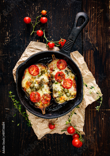Roasted eggplant stuffed with vegetables and mozzarella cheese