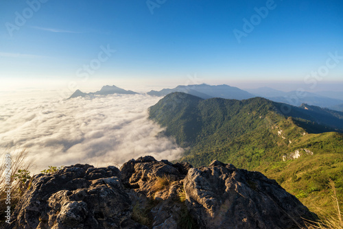a sunrise over the fog in phu chi fah mountain