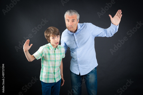 Handsome family doing different expressions in different sets of clothes: be careful
