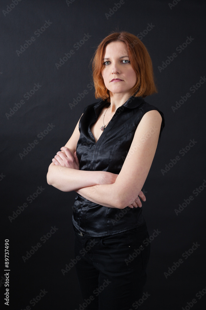 Beautiful woman doing different expressions in different sets of clothes: arms crossed Beautiful woman doing different expressions in different sets of clothes: arms crossed
