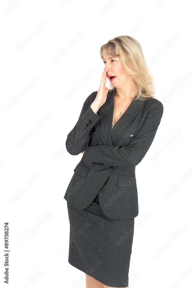 Beautiful businesswoman doing different expressions in different sets of clothes: yawning Beautiful businesswoman doing different expressions in different sets of clothes: yawning
