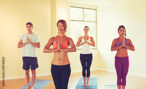 People Relaxing and Doing Yoga