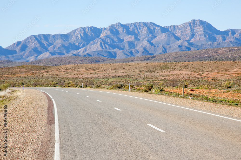 Highway with the Flinders Ranges in the background. South Australia. Highway with the Flinders Ranges in the background. South Australia.