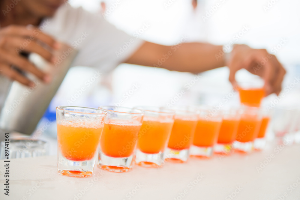 fresh orange juice in shot glasses fresh orange juice in shot glasses