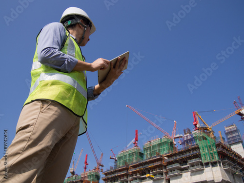 Construction worker using tablet