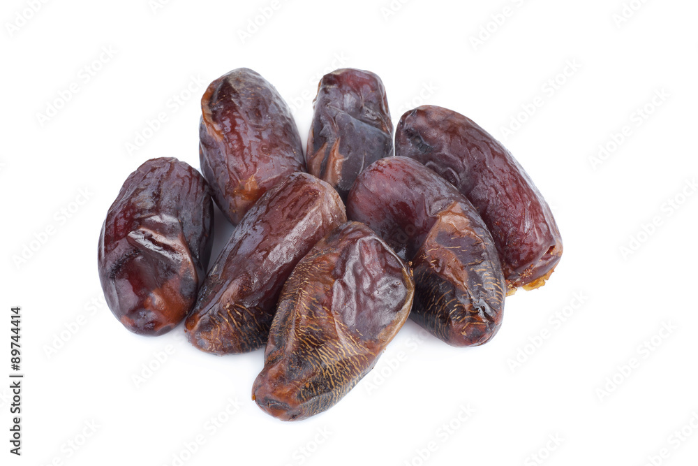 Medjool dates from above isolated on white background Medjool dates from above isolated on white background