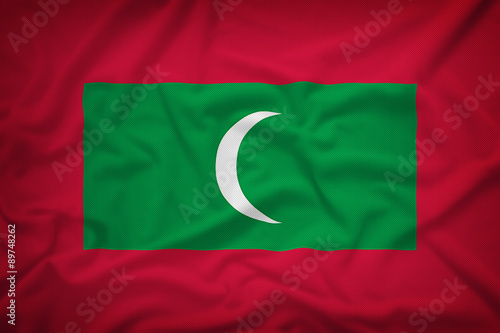 Free Download Maldives flag on the fabric texture background,Vintage style - GFXLoad