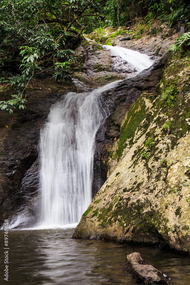 Fototapeta premium Krok E Dok Waterfall in Rainforest, Thailand.