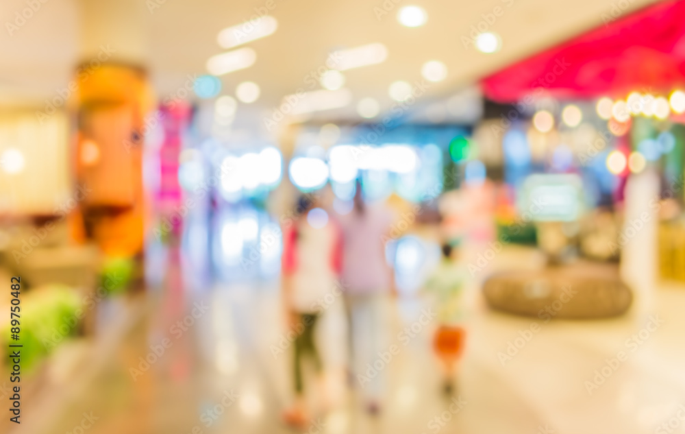 Obraz premium blurred image of shopping mall and people