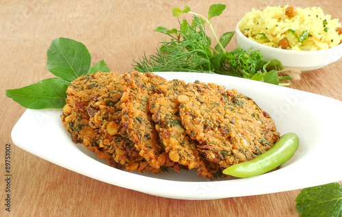 Masala vada, a south Indian vegetarian snack made from chickpea or chana dal batter. photo