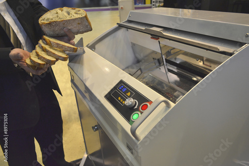 Obraz na plátně The image of an equipment for slicing bread