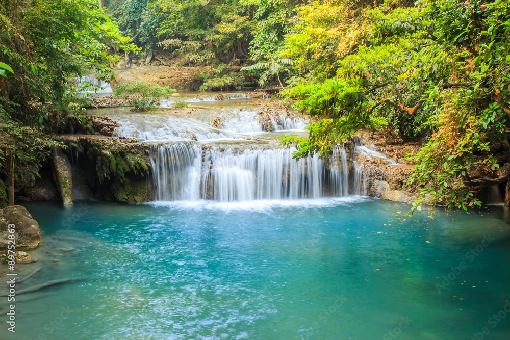 Fototapeta premium Waterfall in deep rain forest.