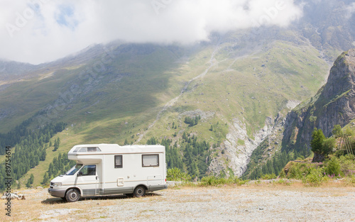 Camper van parked high in the mountains
