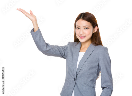 Asian young businesswoman with open hand palm