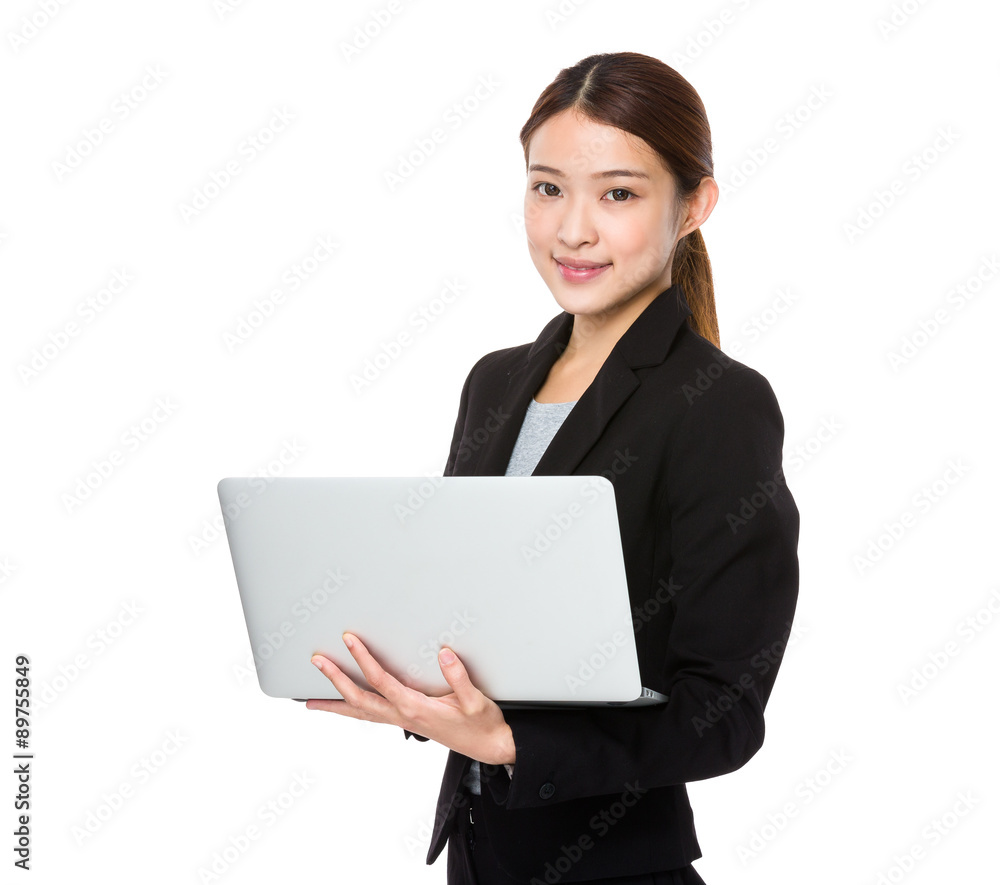 Young businesswoman use of the laptop computer Young businesswoman use of the laptop computer