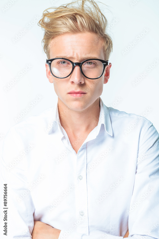Picture of a casual young man looking at the camera Picture of a casual young man looking at the camera